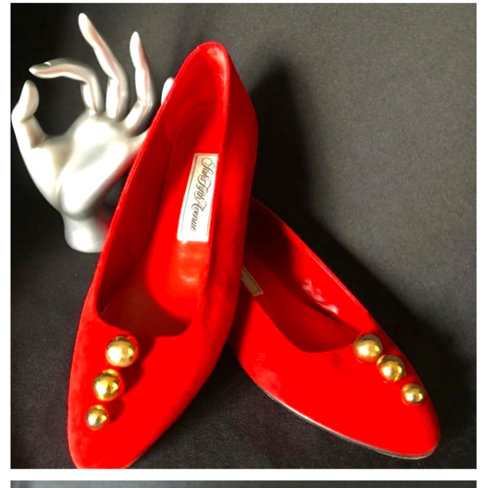 Red suede pointed toe flats.